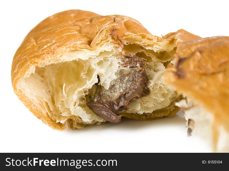 Tasty croissant with chocolate isolated on white