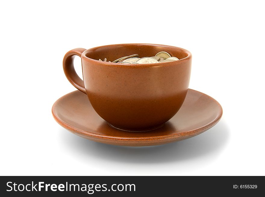 Coffee cup with coins isolated on white background. Coffee cup with coins isolated on white background