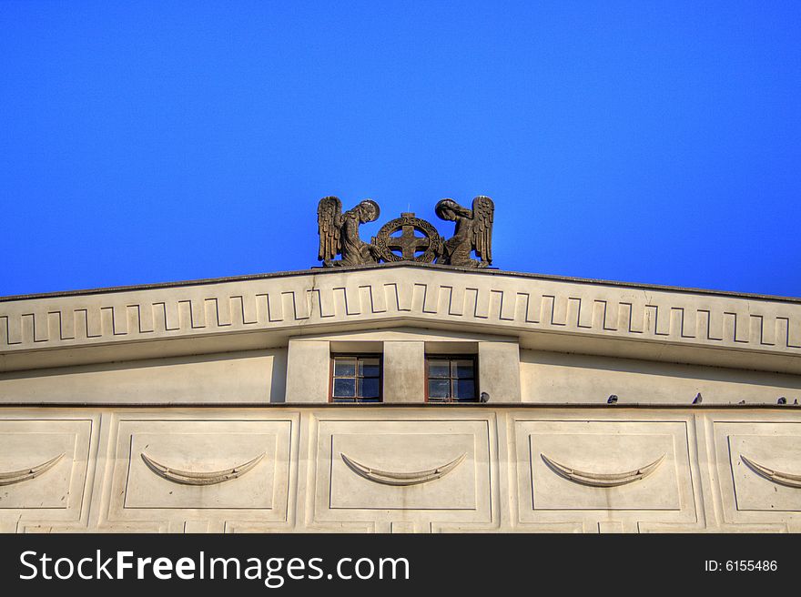 Statue of two angels on the roof of Prague church. By architect Josip Plecnik. Statue of two angels on the roof of Prague church. By architect Josip Plecnik.