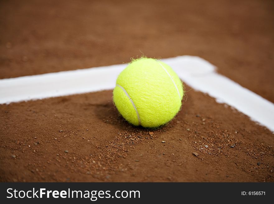 Tennis ball and white line