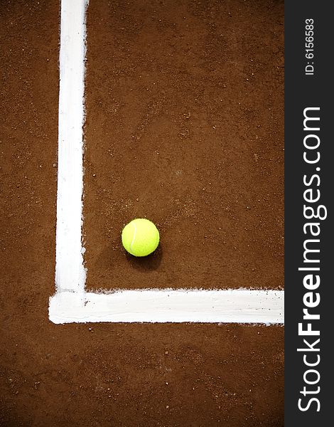 Tennis ball and white line