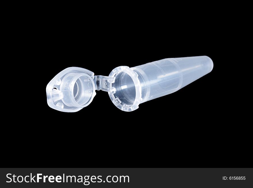 Open empty eppendorf vial isolated on black background
