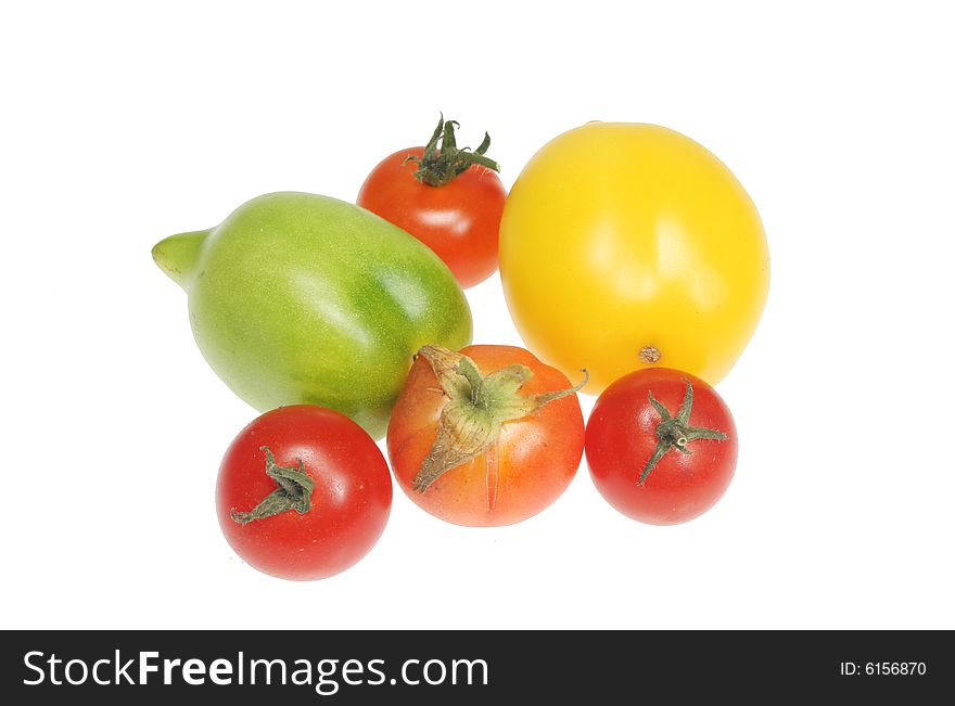 Group of home grown tomatoes isolated on white. Group of home grown tomatoes isolated on white