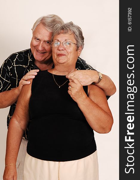 An happy senior couple smiling and happy in front of the camera. An happy senior couple smiling and happy in front of the camera.