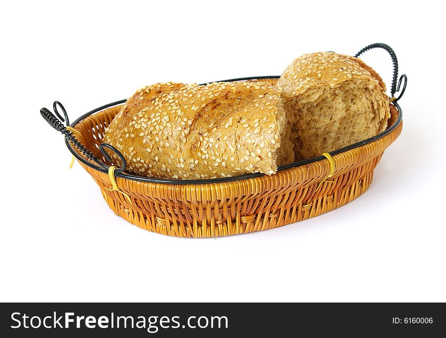 Fresh roll in a basket isolated on a white background