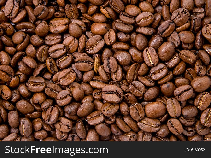 Background, pattern close-up shot of coffee beans