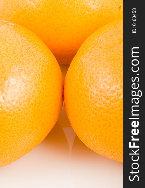 Abstract fresh oranges isolated on white background