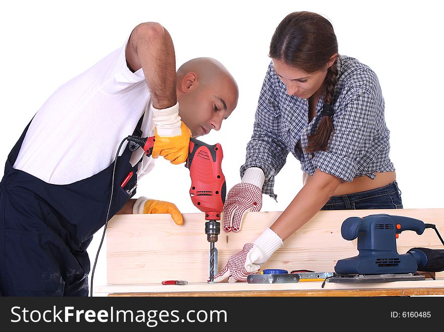 Construction workers at work on white background