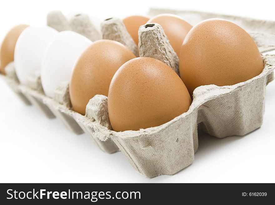 Fresh eggs isolated on white
