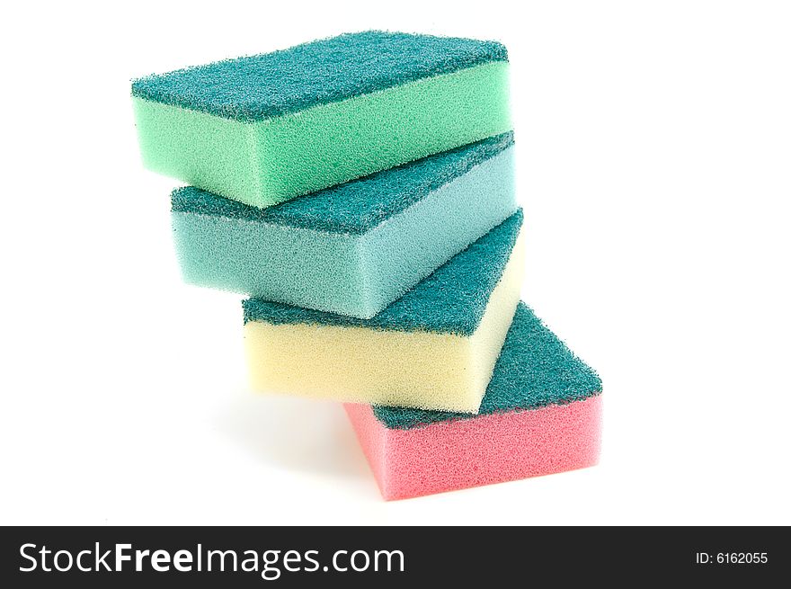 Multicolored cleaning sponges isolated on white background