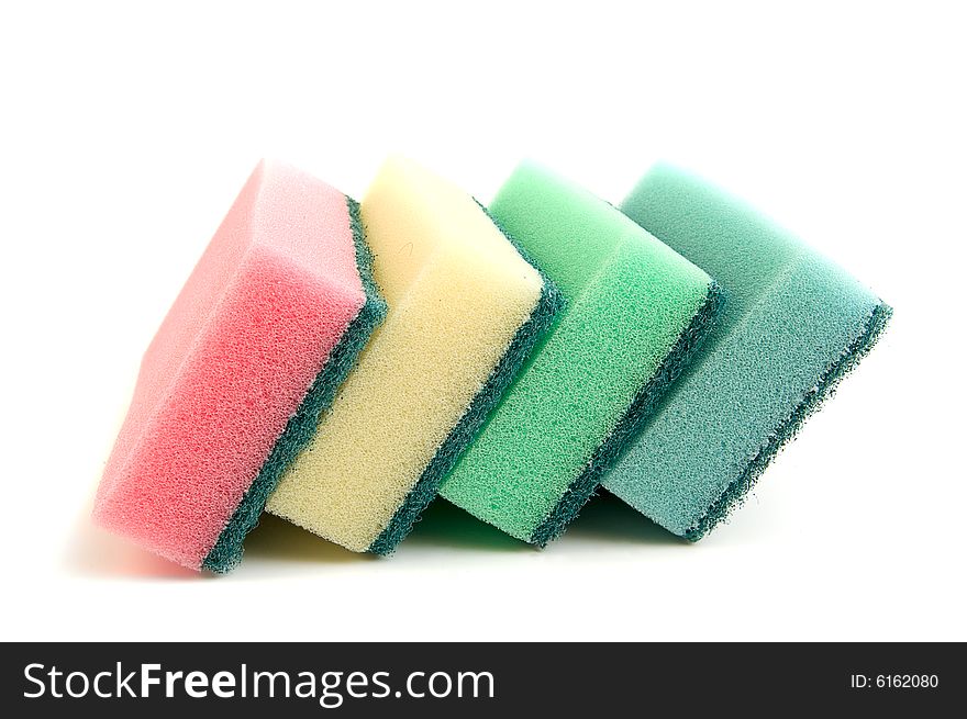 Multicolored cleaning sponges isolated on white background