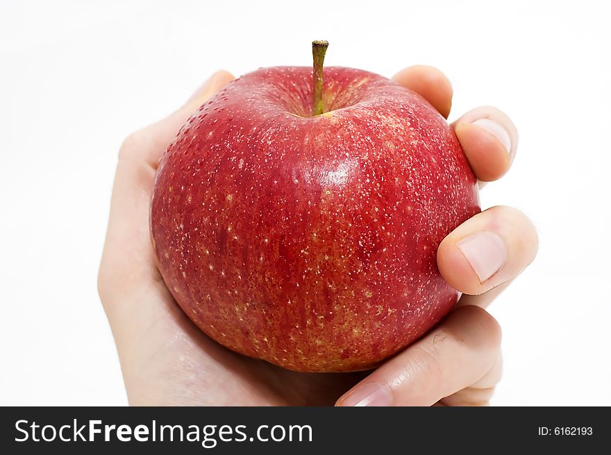 Man holding a red apple isolated on white background. Man holding a red apple isolated on white background