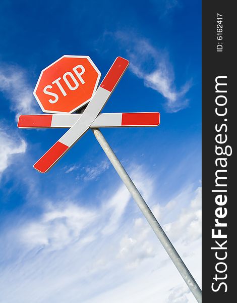 Traffic sign over blue and cloudy sky. Traffic sign over blue and cloudy sky