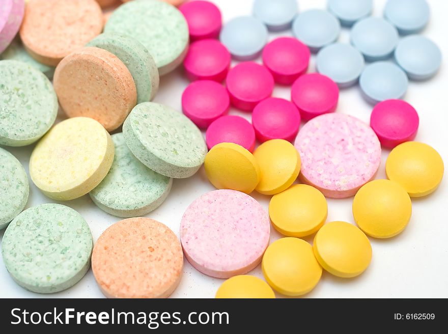 A collection of colorful pills, closeup. A collection of colorful pills, closeup