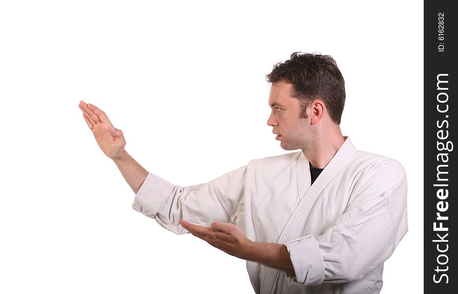 Side view of man in martial arts pose