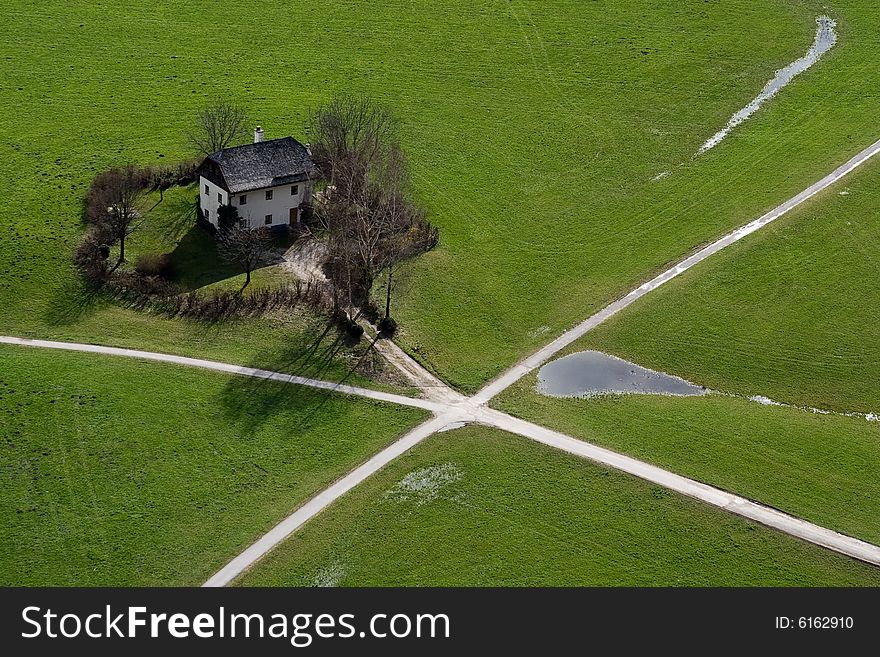 Top view of the small house near road crossing in Salzburg (West Austria)