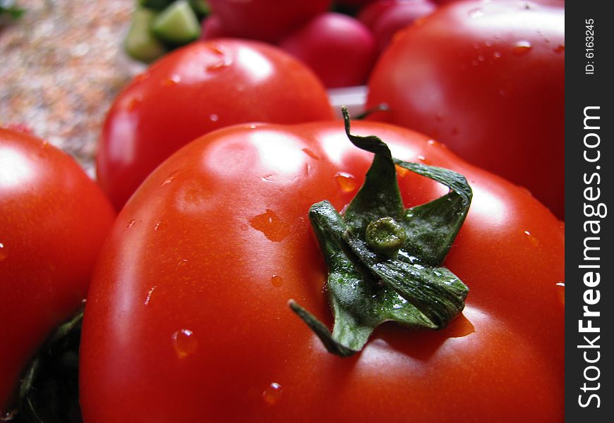 The Big and small red tomatoes. The Big and small red tomatoes