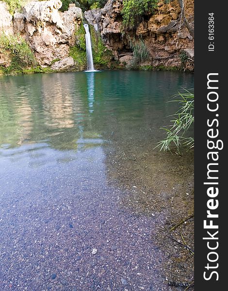 Eautiful waterfall in hidden secret lagoon. Eautiful waterfall in hidden secret lagoon.