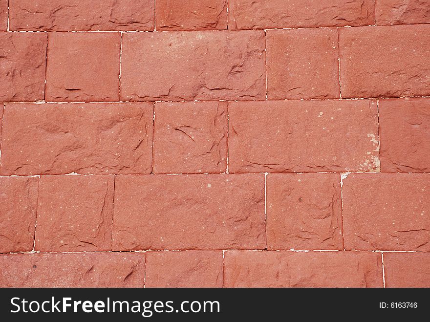 The ancient Chinese red brick wall background.