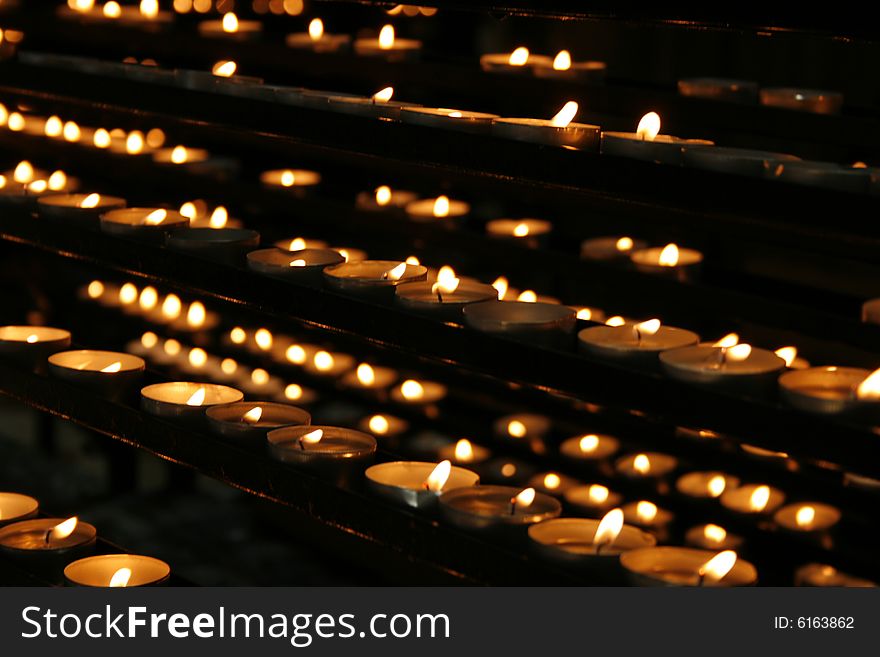 Very romantic candles background in the church