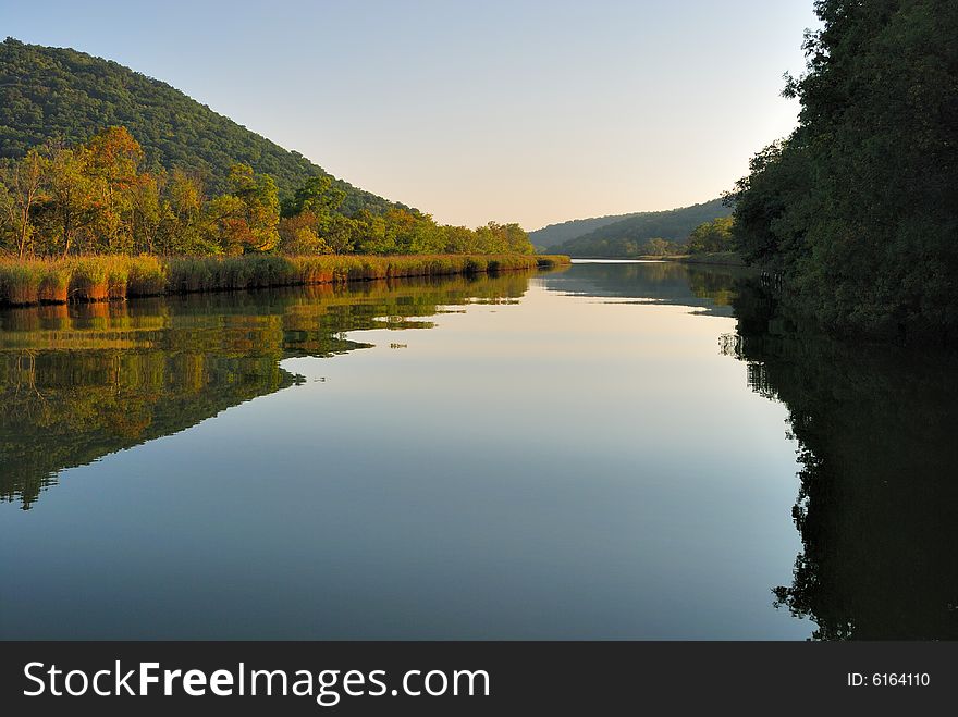 Gorgeous landscape of calm river and big mountain