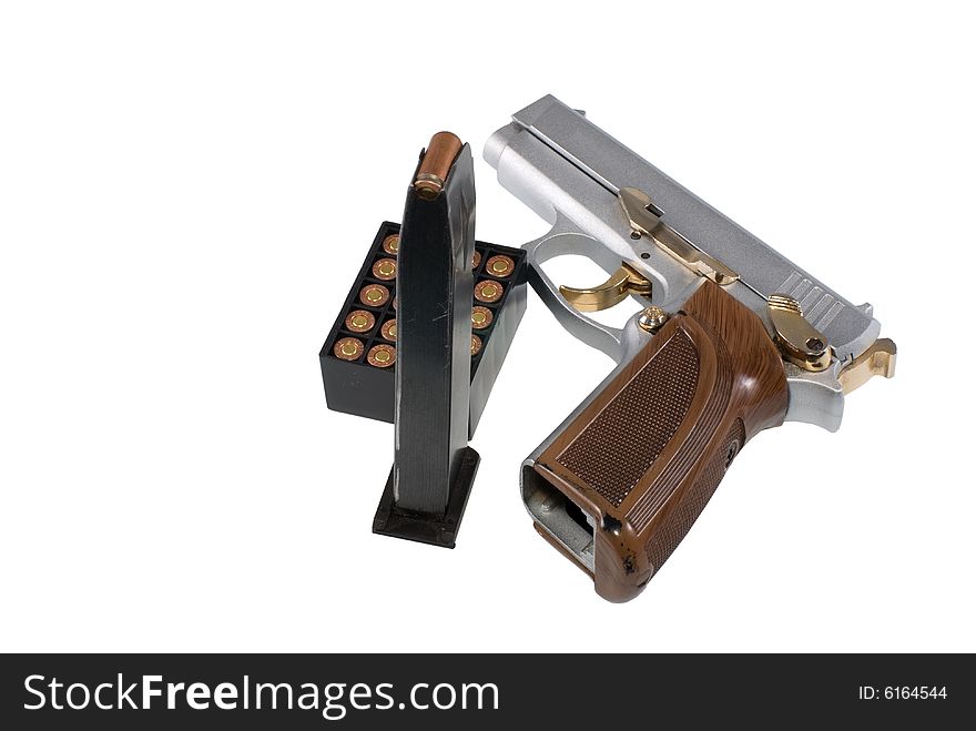 Silvery pistol, holder and pack of cartridges, on a white background.