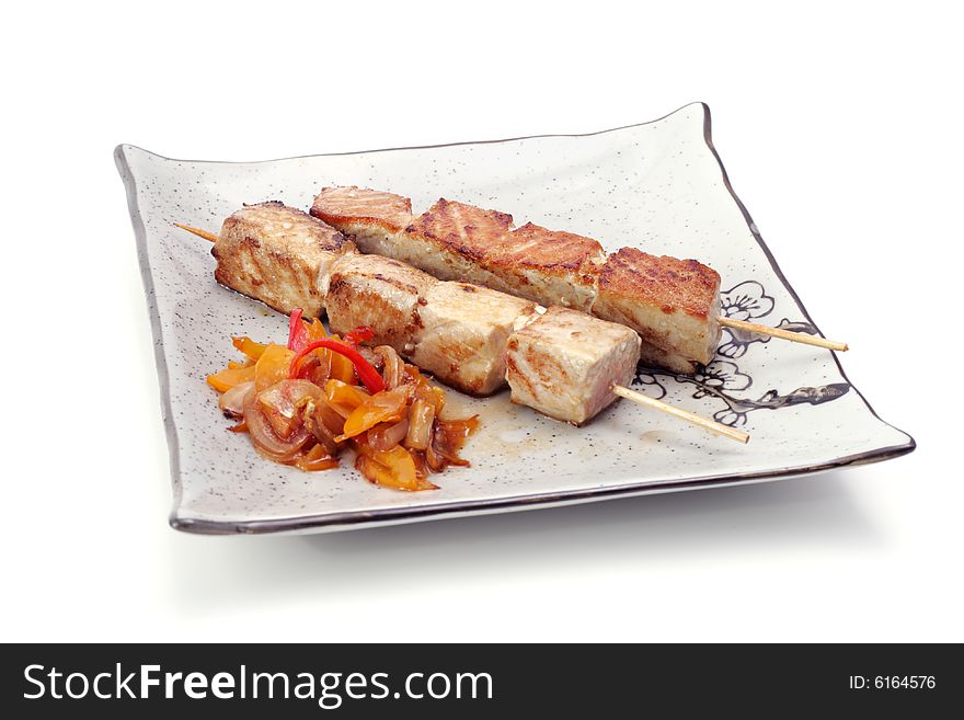 Japan Shish Kebab from Fish with Vegetables. Isolated on White Background. Japan Shish Kebab from Fish with Vegetables. Isolated on White Background