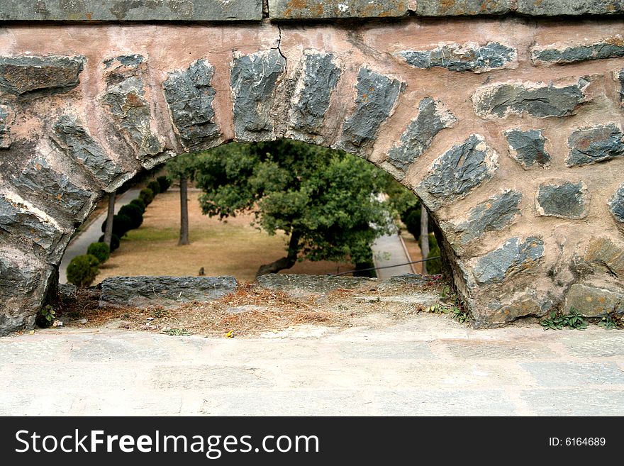 Stone wall with an arch in the Viceroy's residence in Shimla