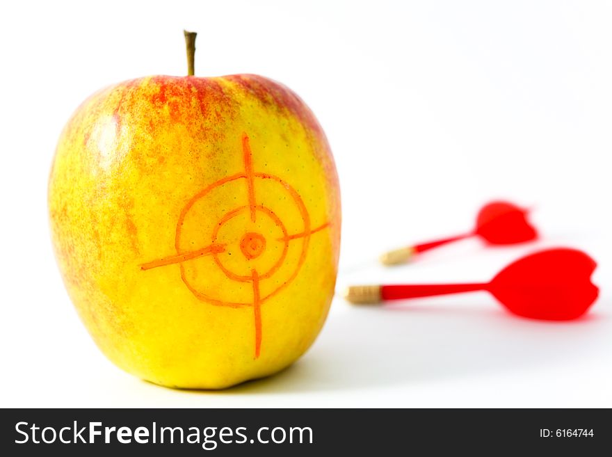 Yellow apple with darts