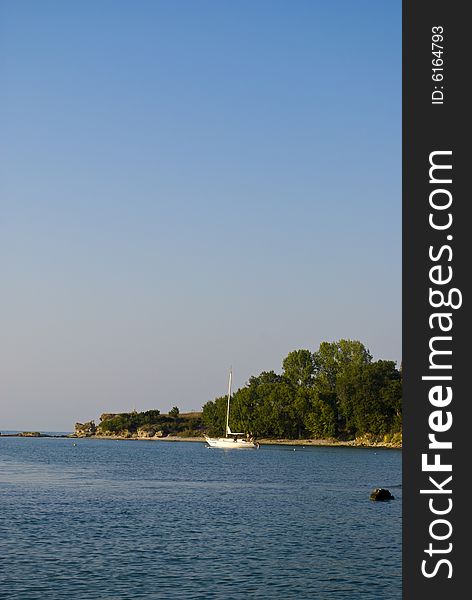 A sailing boat near the shore