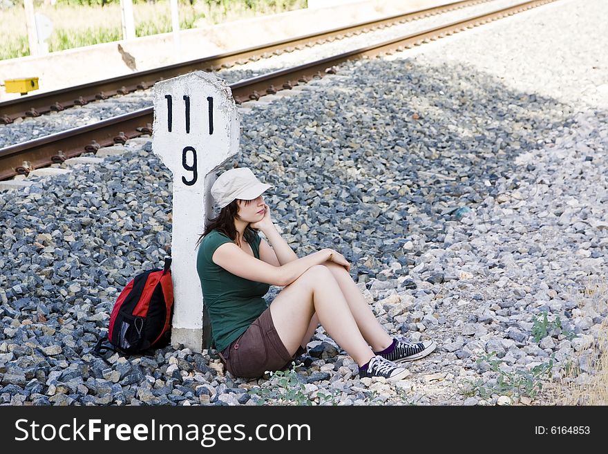 Backpacker Taking A Brake In The Shadow