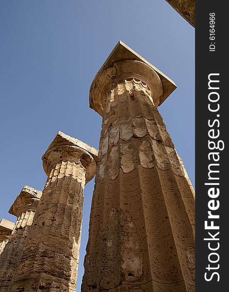 Bottom to top view of columns at the Greek Temple of Selinunte (Sicily, Italy). UNESCO world heritage site. Bottom to top view of columns at the Greek Temple of Selinunte (Sicily, Italy). UNESCO world heritage site