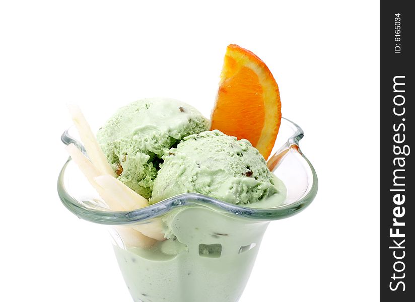 Pistachio Ice Cream with Orange and Apple Slice. Isolated on White Background
