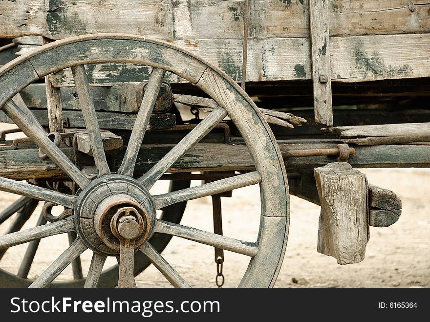 Wheel of an old cart in detail. Wheel of an old cart in detail