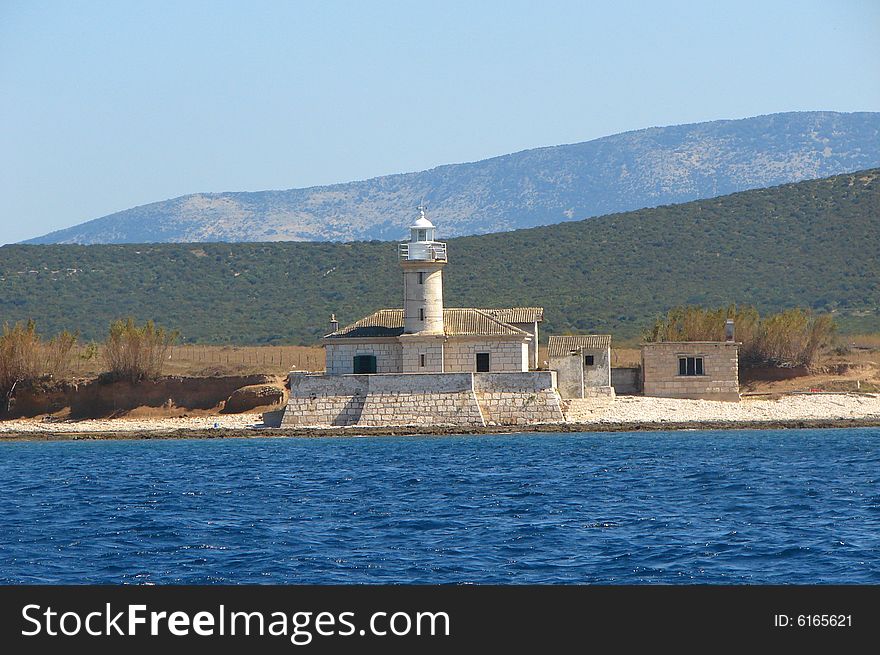 A lighthouse on some mediterranean island