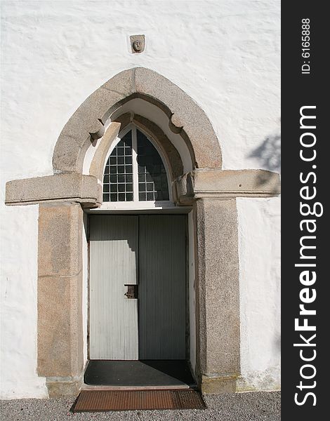 White stone church, Skjeberg Sarpsborg. Norway
Entrance with stone head. White stone church, Skjeberg Sarpsborg. Norway
Entrance with stone head