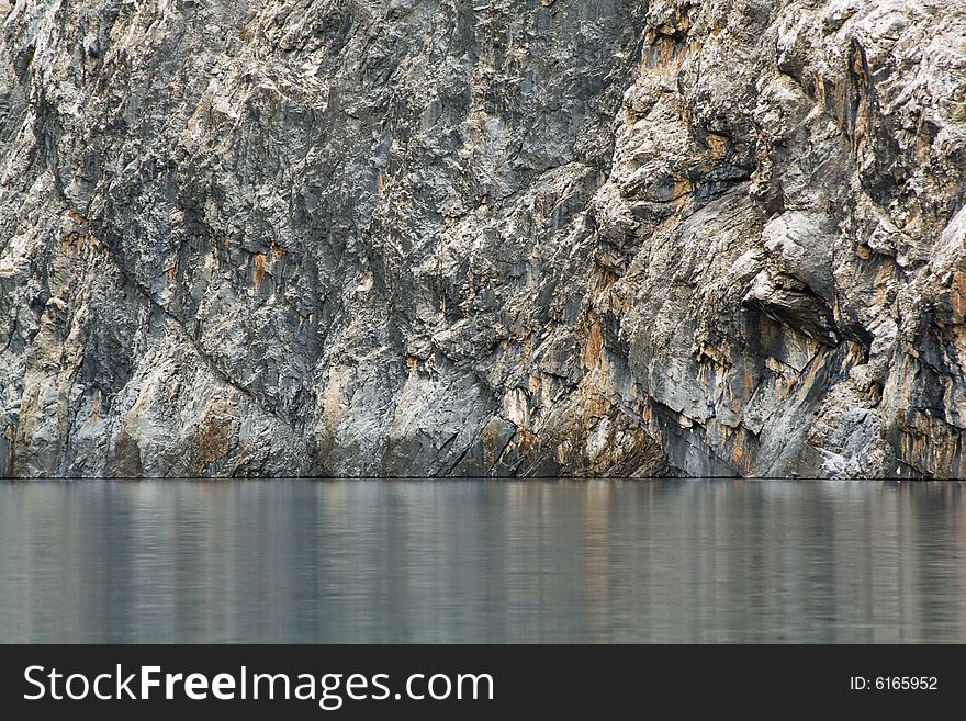 Rock wall above the lake