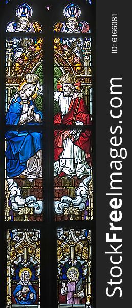 Stained-glass window in the old church. Stained-glass window in the old church