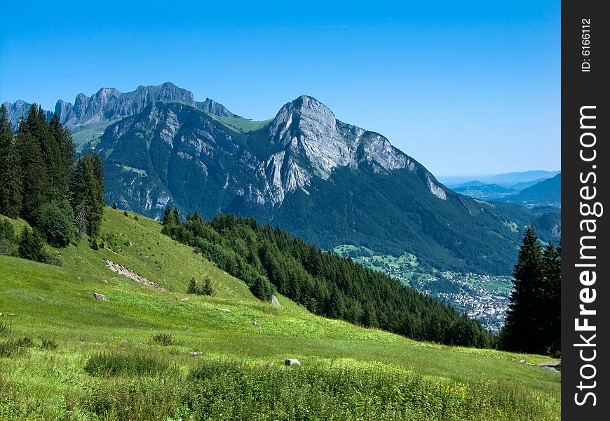 In center of image is Gonzen peak (1829 m), above Sargans city (in Rhine Valley). In center of image is Gonzen peak (1829 m), above Sargans city (in Rhine Valley)