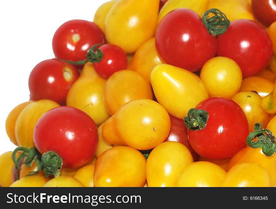 Lot of yellow and red tomatoes