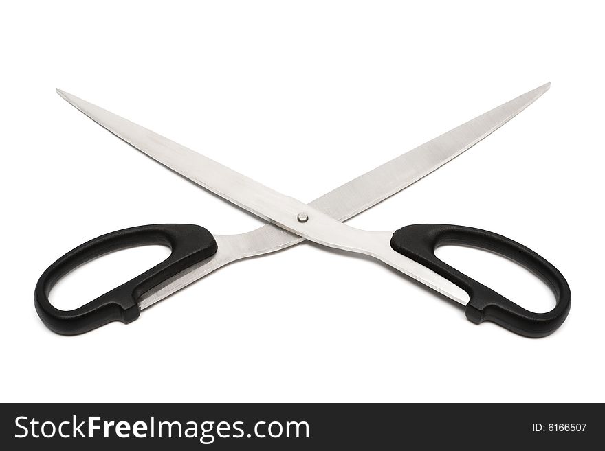 Modern metal scissors on a white background