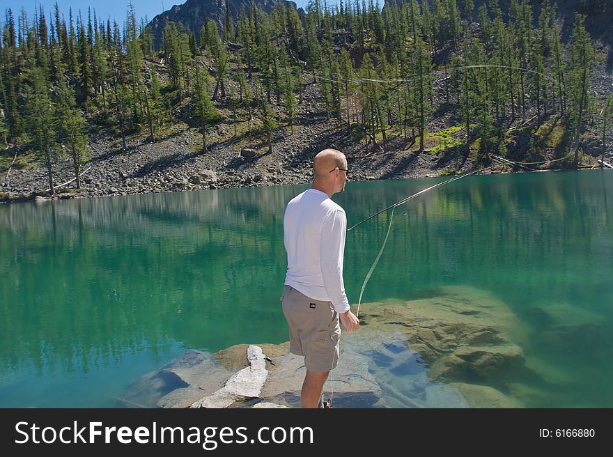 Fly fishing in the North Cascade Mountains. Fly fishing in the North Cascade Mountains