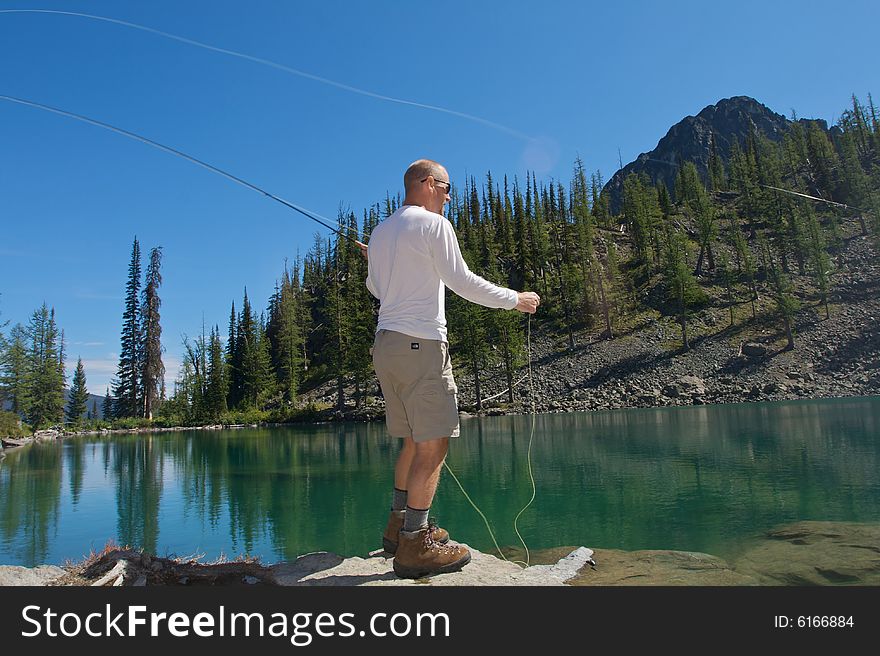 Fly fishing in the North Cascade Mountains. Fly fishing in the North Cascade Mountains