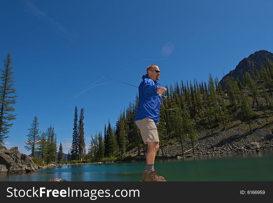 Fly fishing in the North Cascade Mountains. Fly fishing in the North Cascade Mountains