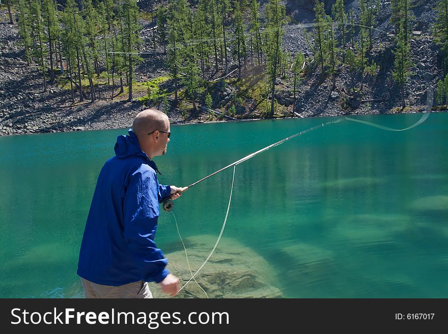 Fly fishing in the North Cascade Mountains. Fly fishing in the North Cascade Mountains