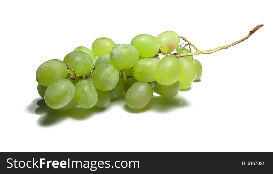 Fresh green grapes cluster isolated. Fresh green grapes cluster isolated