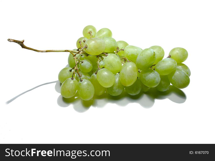 Fresh green grapes cluster isolated. Fresh green grapes cluster isolated