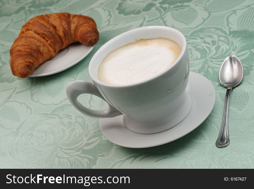 A nice breakfast, with a good cappuccino and a fresh croissant. A nice breakfast, with a good cappuccino and a fresh croissant