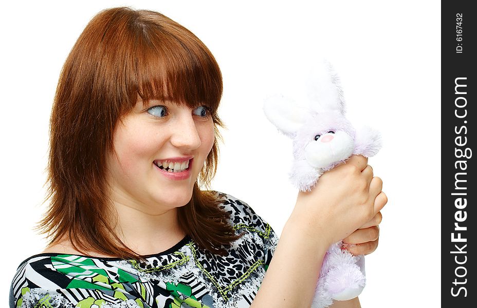 Young girl with toy bunny