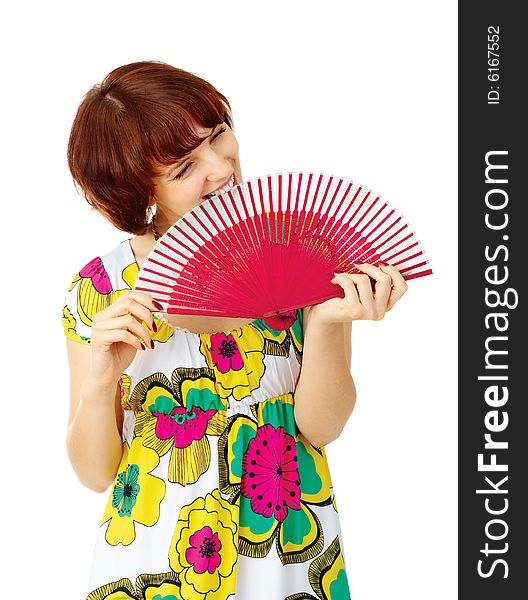 Happy young girl with fan over white